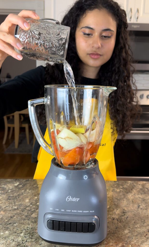 Adding water to a blender